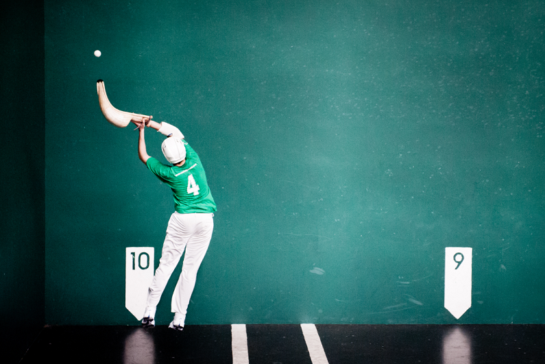 Man playing jai-alai.