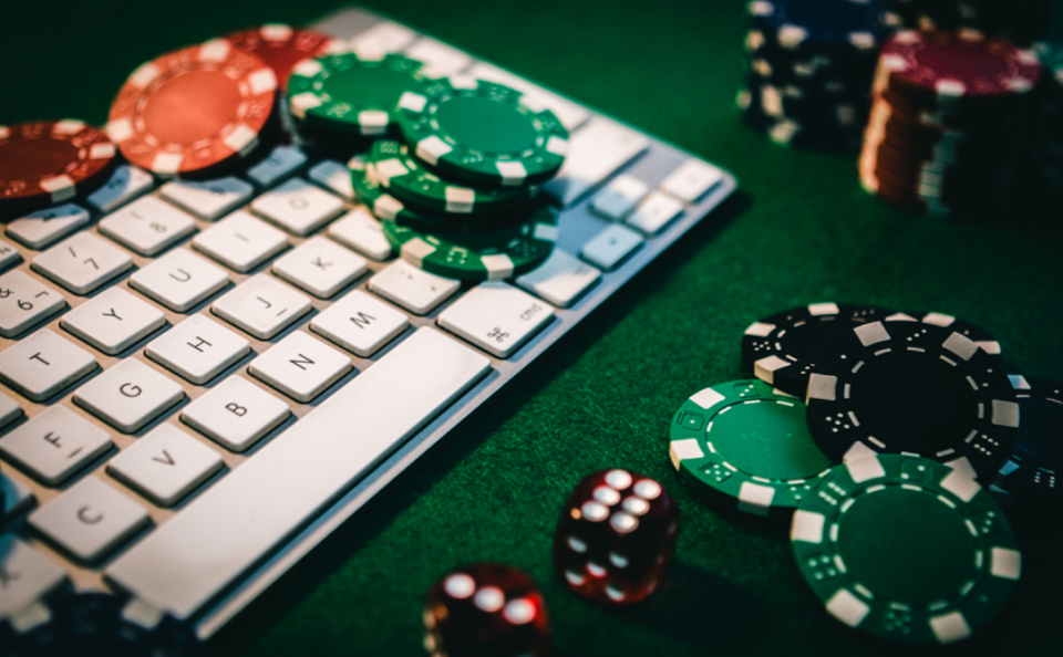 computer keyword and poker chips