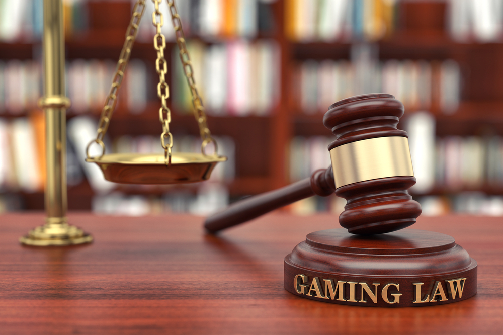 A wooden gavel labeled Gaming Law